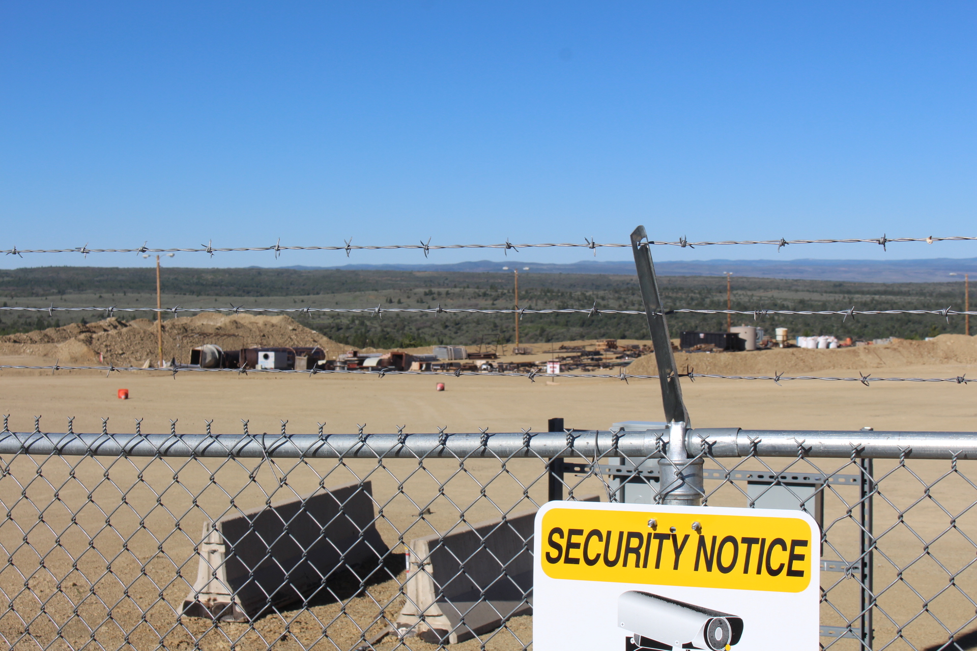 security fence with barb wire at us oil sands pr springs mine site